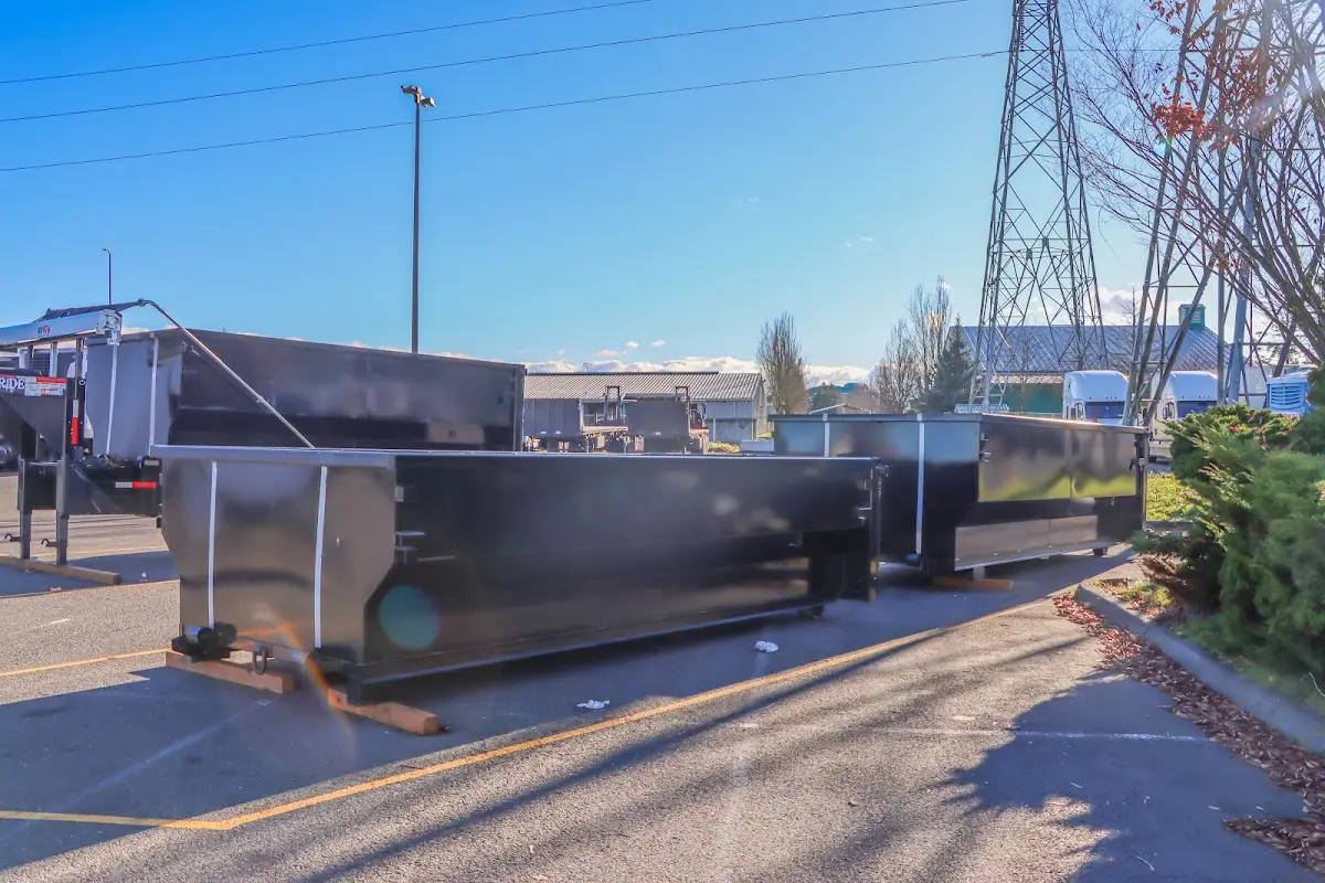 Roll-off dumpster ready for waste disposal at job site for 2 Yard Dumpster Rental in Credit River